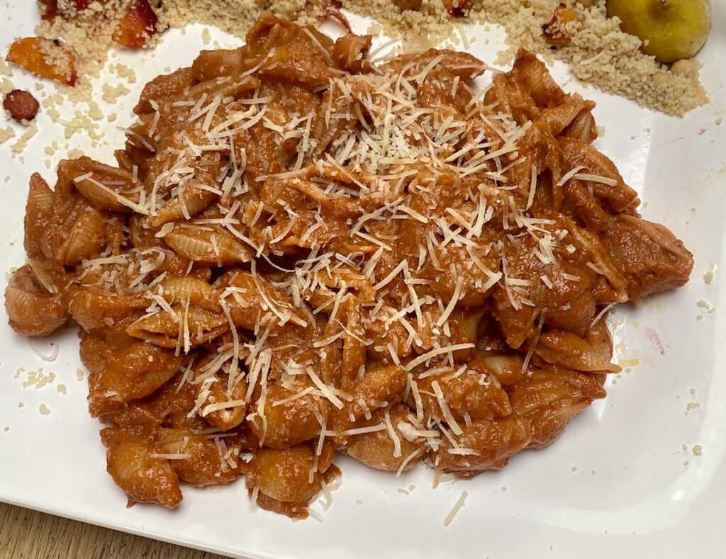 A dish of sun kissed tomato pasta.